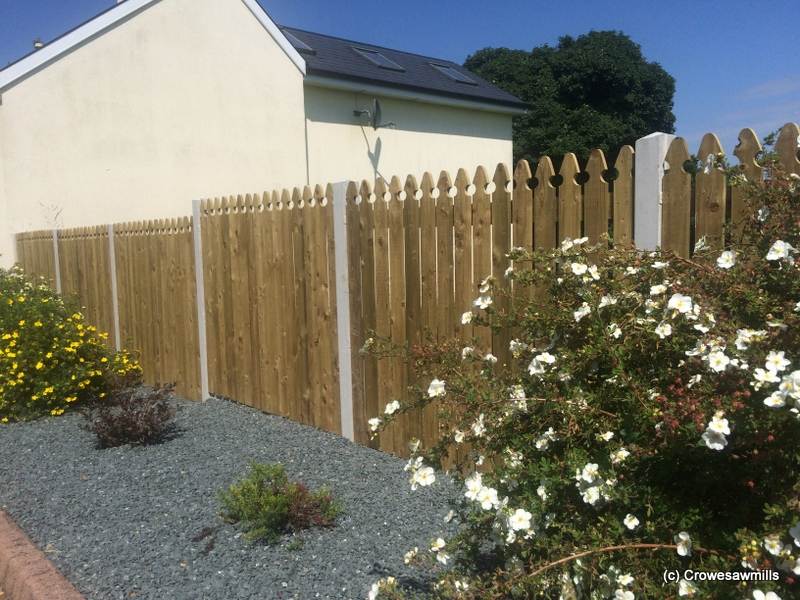 Cresoted Timber Fence with Special Top Timber Posts